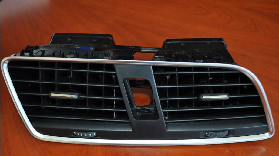 Automotive air conditioning air outlet injection molding